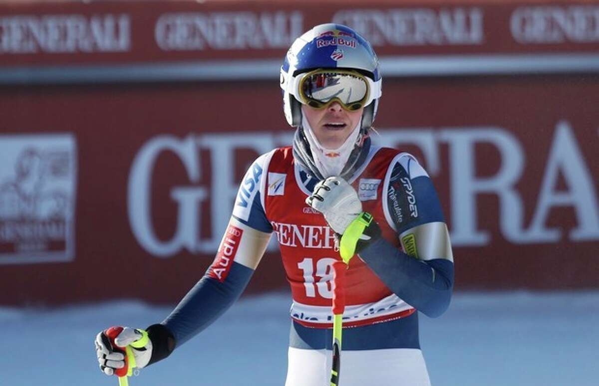 Lindsey Vonn, of the United States, reacts in the finish area following her run at the women's World Cup downhill ski race in Lake Louise, Alberta, Friday, Dec. 6, 2013. (AP Photo/The Canadian Press, Jeff McIntosh)