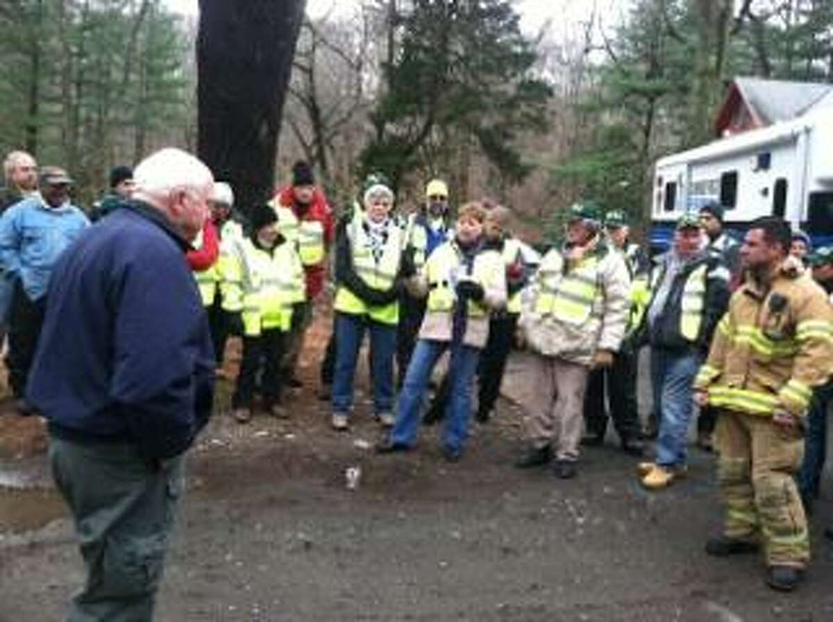 Participants in the training exercise are briefed on the day's activities. 
