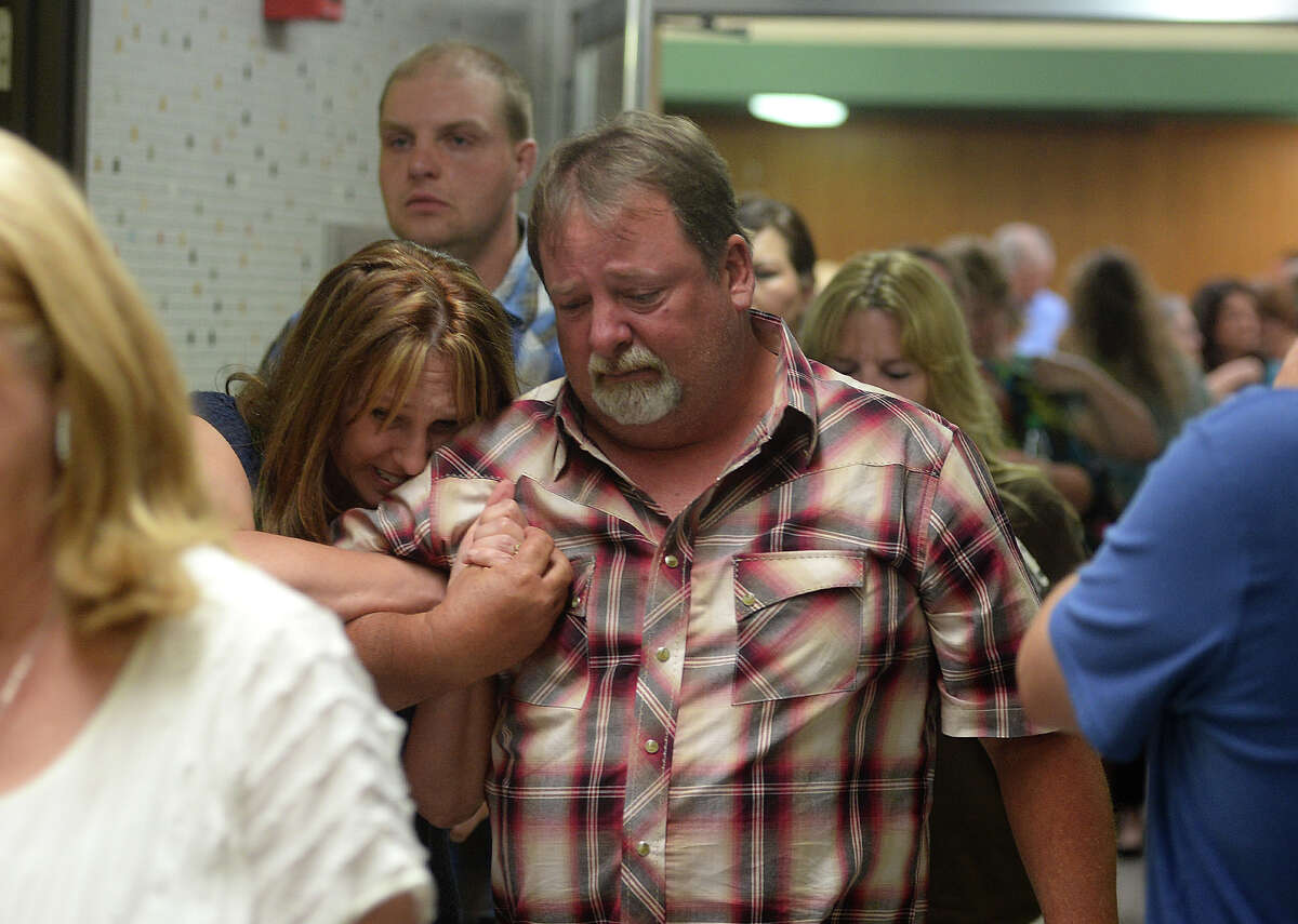 The parents of Courtney Ray Sterling, 15 and Connely Renee Burns, 20, exit the courtroom Thursday after jurors found Crystal Boyett guilty of manslaughter. Photo taken Thursday, April 23, 2015 Guiseppe Barranco/The Enterprise