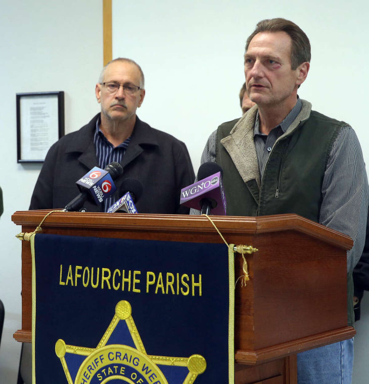 Lafourche Parish Sheriff Craig Webre, right, speaks during a news conference Thursday evening, in Lockport, La., after 38-year-old Ben Freeman went on a shooting rampage in four locations in two parishes in south Louisiana. Authorities say Freeman was embroiled in a custody fight with his ex-wife. He killed himself after attacking his current wife, his former in-laws and his onetime boss at a hospital that fired him. (AP Photo/The Daily Comet, Abby Tabor)