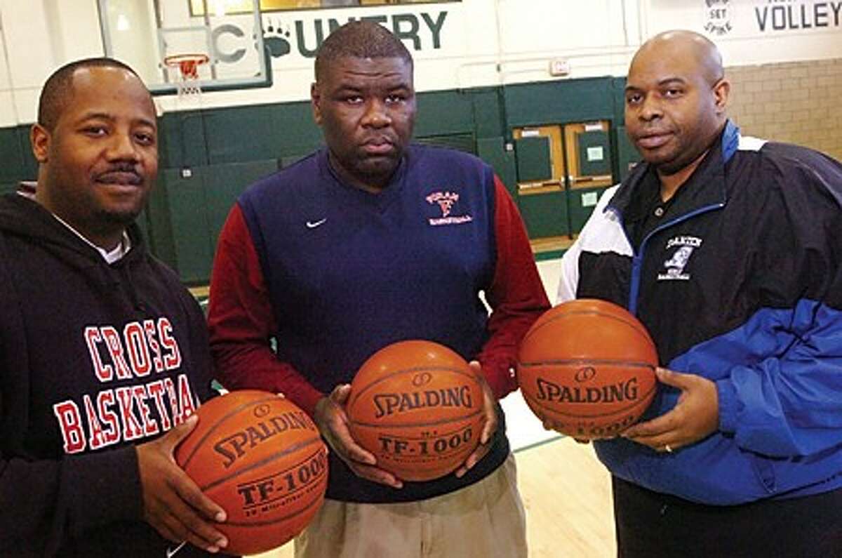 Anthony Hill, Scott Nails and Gary Peterson all graduated from Norwalk in 1987 and now are all coaching their own high school basketball teams. hour photo/matthew vinci