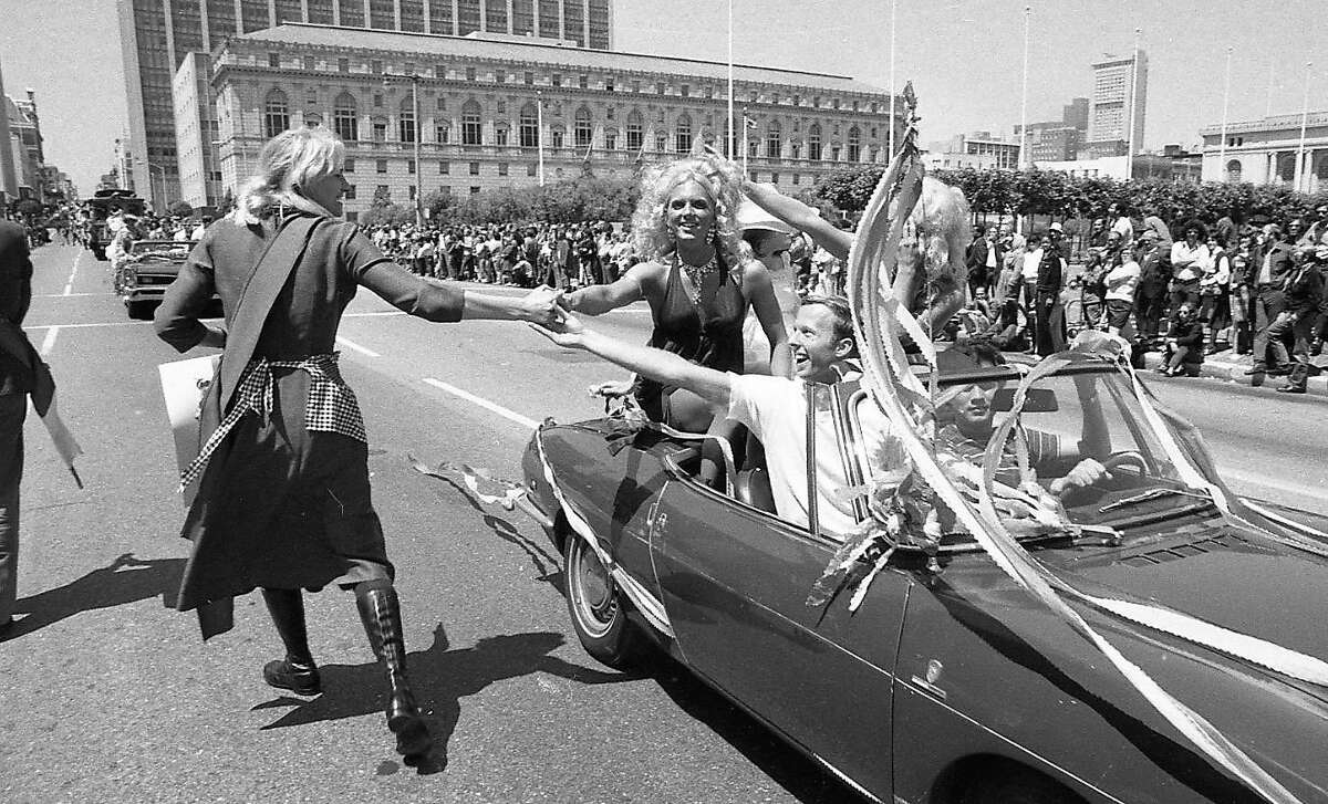 A convertible approaches the Civic Center during the first Gay Freedom Day Parade in San Francisco, on June 25, 1972.