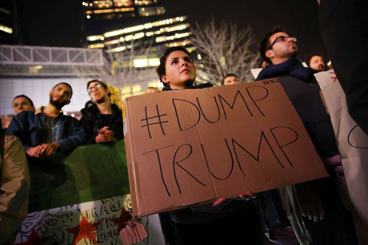 NEW YORK, NY - DECEMBER 10: People listen to speakers at a demonstration against racism and conservative presidential candidate Donald Trump's recent remarks concerning Muslims on December 10, 2015 in New York City. Dozens or demonstrators and activists converged at Columbus Circle to denounce the politics of Trump and the treatment of Muslim refugees both in America and Europe. (Photo by Spencer Platt/Getty Images)
