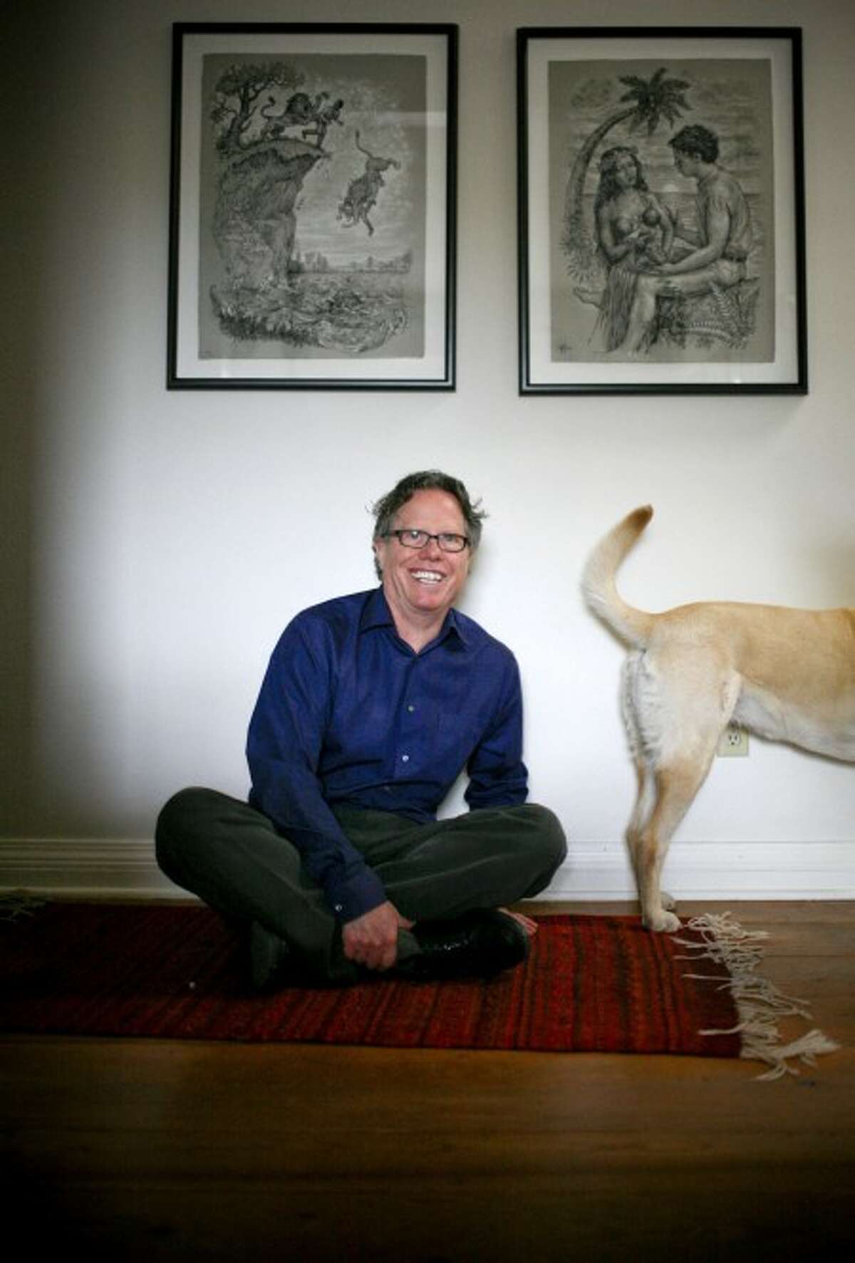 Jack Handey, author of "What I''d Say to Martians" and "Deep Thoughts," poses with his dog Ruby at his Santa Fe, N.M. home. (AP Photo/Craig Fritz)