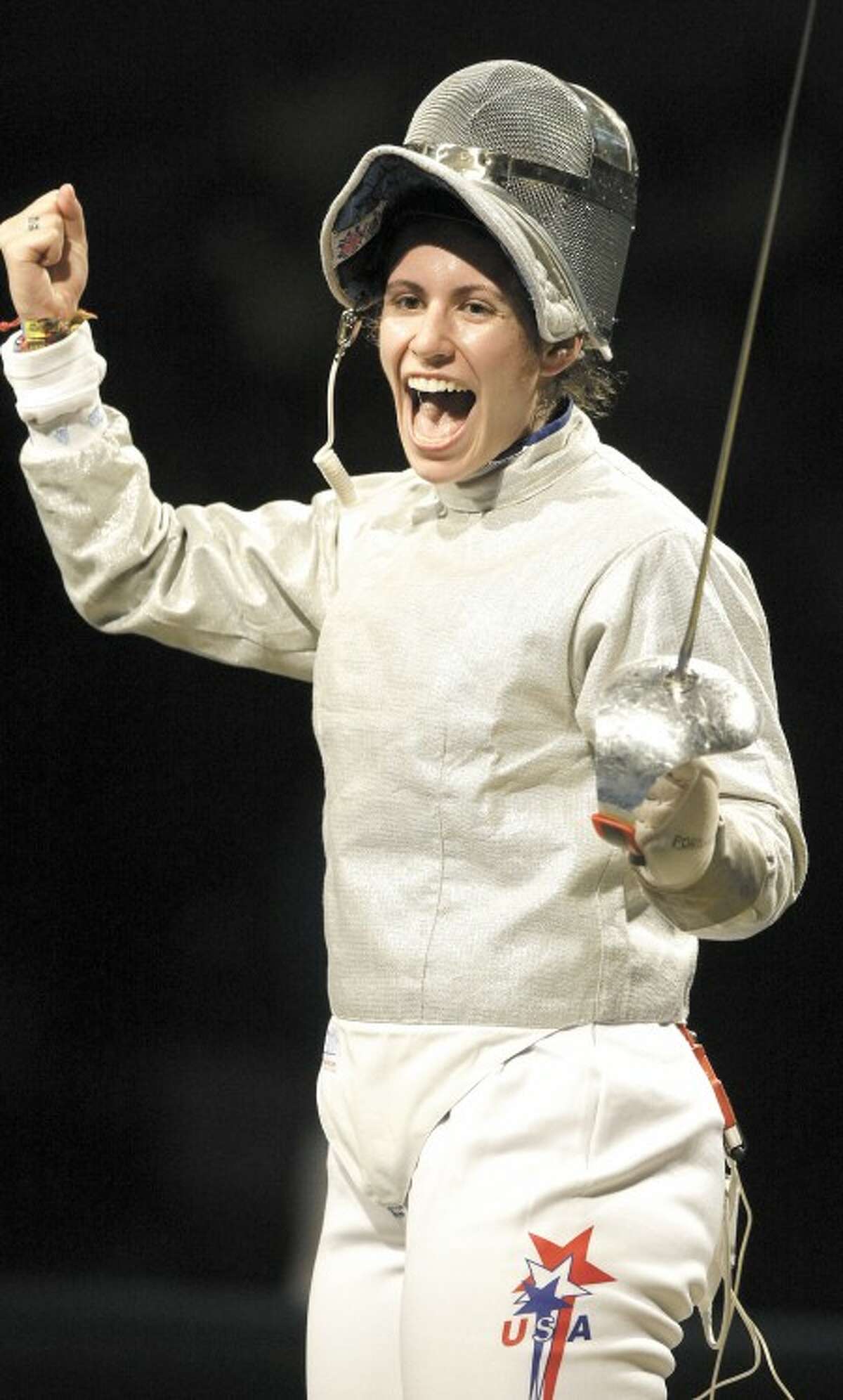 AP Photo - Success by USA''s Sada Jacobson, a Yale graduate who won the silver medal in fencing at the Olympics, brings more people into sports.