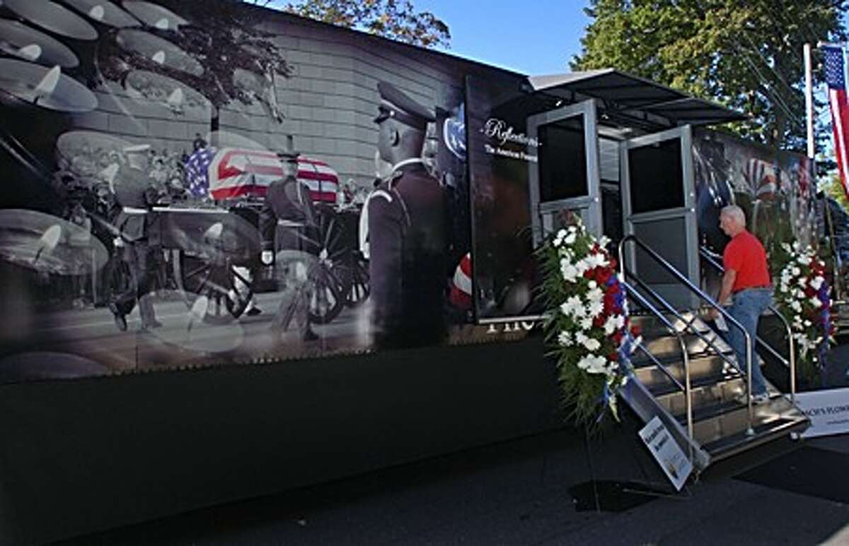 The traveling historical exhibit, " Reflections: The American Funeral" was part of an event sponsored by Hoyt-Cognetta Funeral Home at the Town Green Saturday . Hour photo / Erik Trautmann