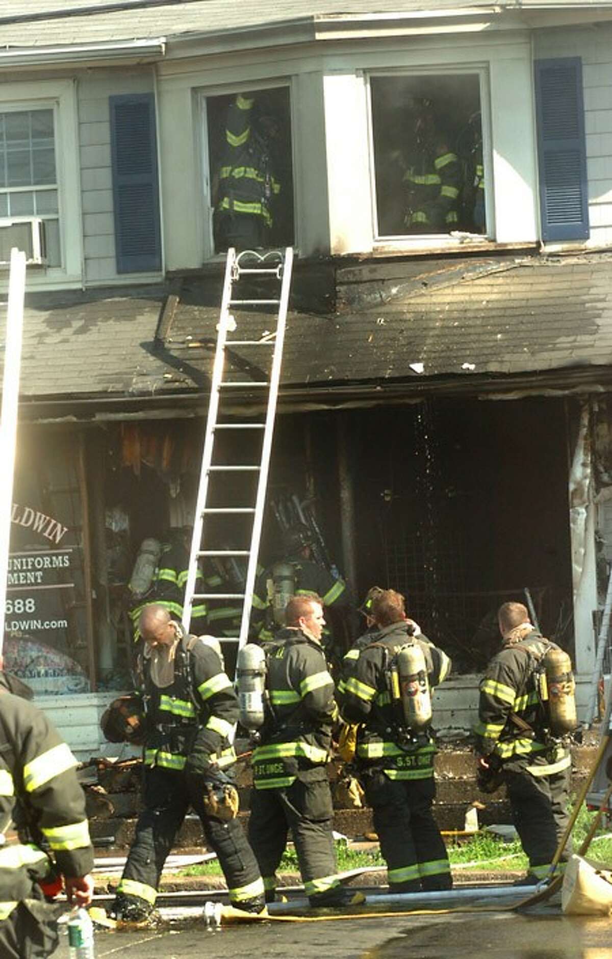 Structure fire burns out retail and residental spaces on 1st street in Norwalk on Monday morning/hour photo matthew vinci