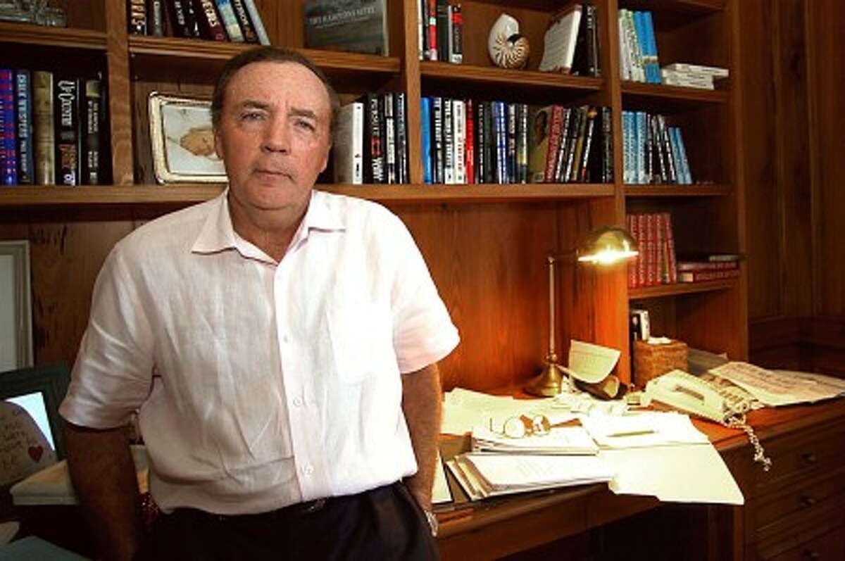 This Feb. 28, 2003 file photo shows author James Patterson, of Palm Beach Fla, posing in his study. Patterson''s latest best-seller, "The Angel Experiment," is a little different from his usual hits. The novel isn''t new; it came out four years ago. Its sales aren''t happening at bookstores, but mostly on the Kindle store at Amazon.com. And the price is low even for an old release: $0.00 (AP Photo)