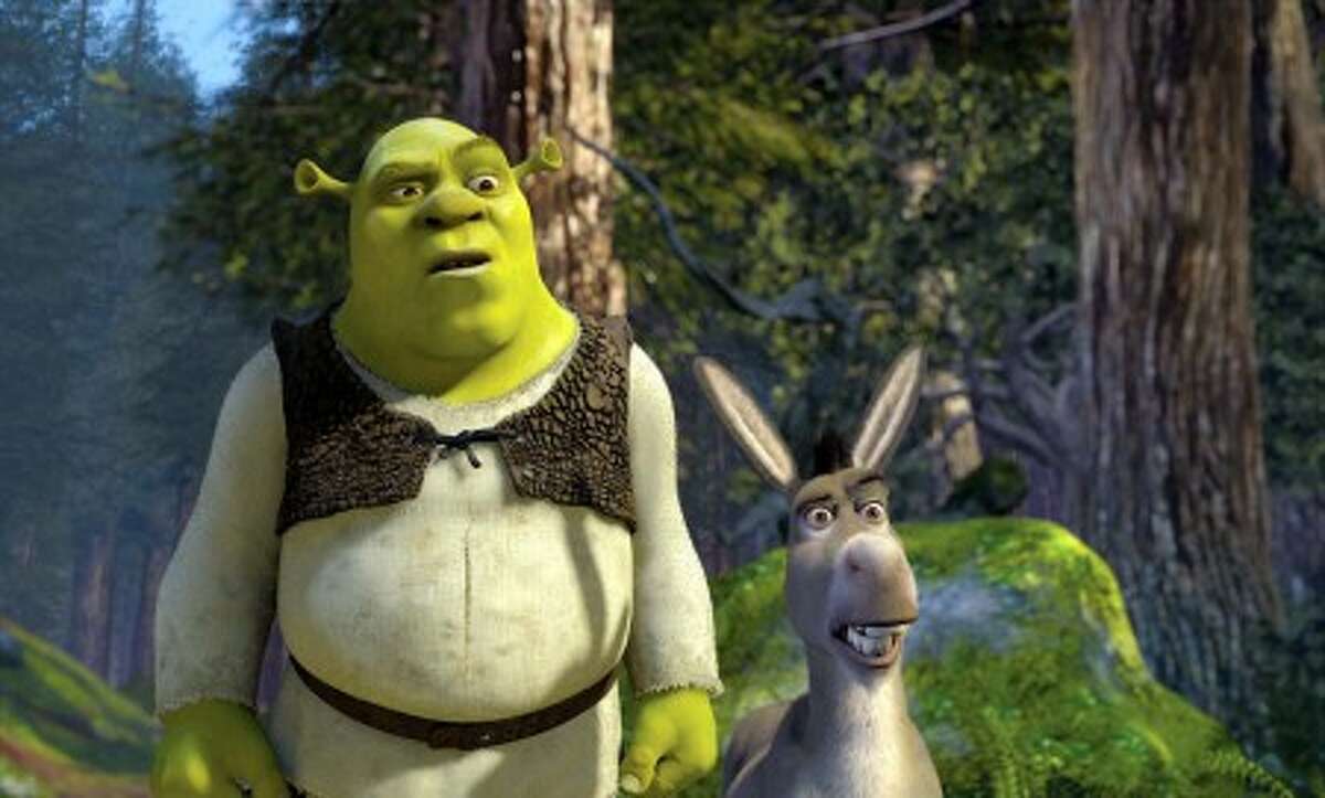 In this 2004 film publicity image released by DreamWorks Pictures, Shrek, voiced by Mike Myers, left, and Donkey, voiced by Eddie Murphy are shown in a scene from "Shrek 2." (AP Photo/DreamWorks Pictures, file)