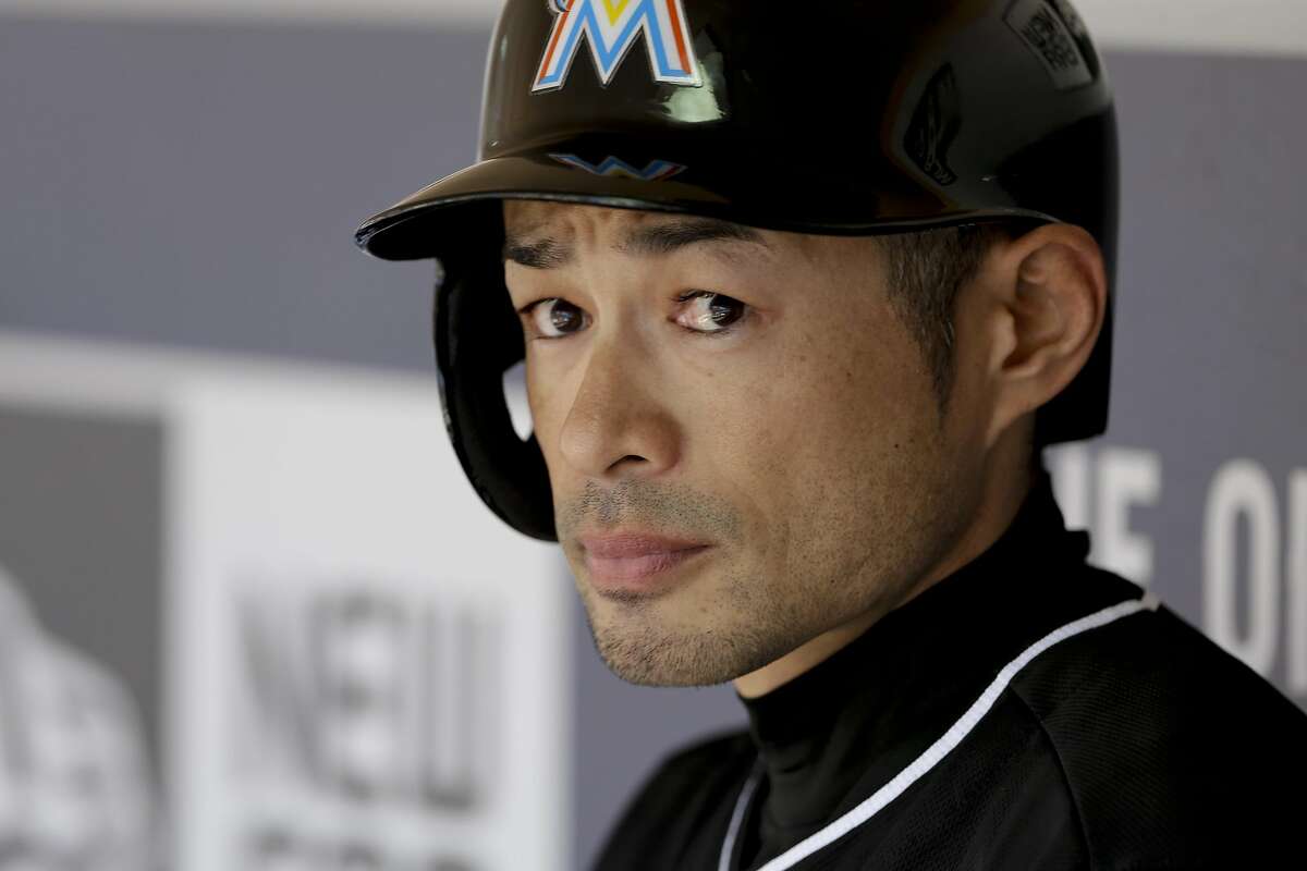 Miami Marlins' Ichiro Suzuki looks on from the dugout in a baseball game against the San Diego Padres Wednesday, June 15, 2016, in San Diego. (AP Photo/Gregory Bull)