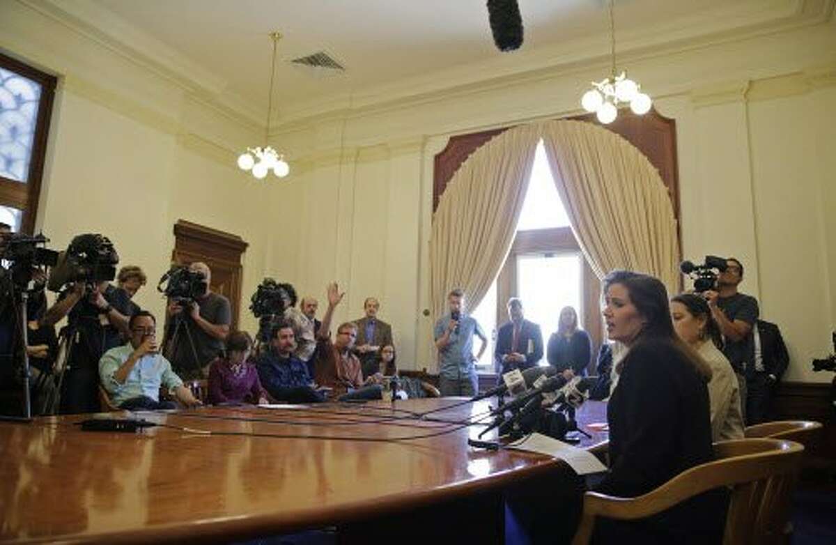 Oakland Mayor Libby Schaaf faces reporters during a news conference at City Hall Wednesday, June 15, 2016, in Oakland, Calif. Schaaf removed the interim police chief Wednesday after appointing him less than a week ago amid a widening sex scandal involving several officers. The mayor said new information led her to lose confidence in Ben Fairow after she named him to lead the beleaguered department. (AP Photo/Eric Risberg)