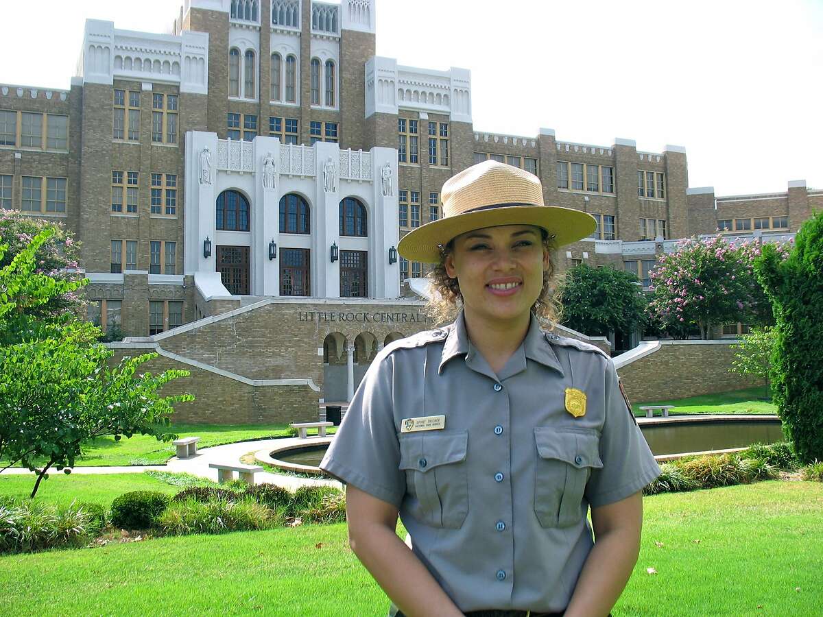 National Park Service Ranger Spirit Trickey takes visitors on tours of Little Rock Central High School in Little Rock, Ark. Her mother was one of the Little Rock Nine who integrated the school in 1951 under the protection of 101st Airborne Division soldiers.