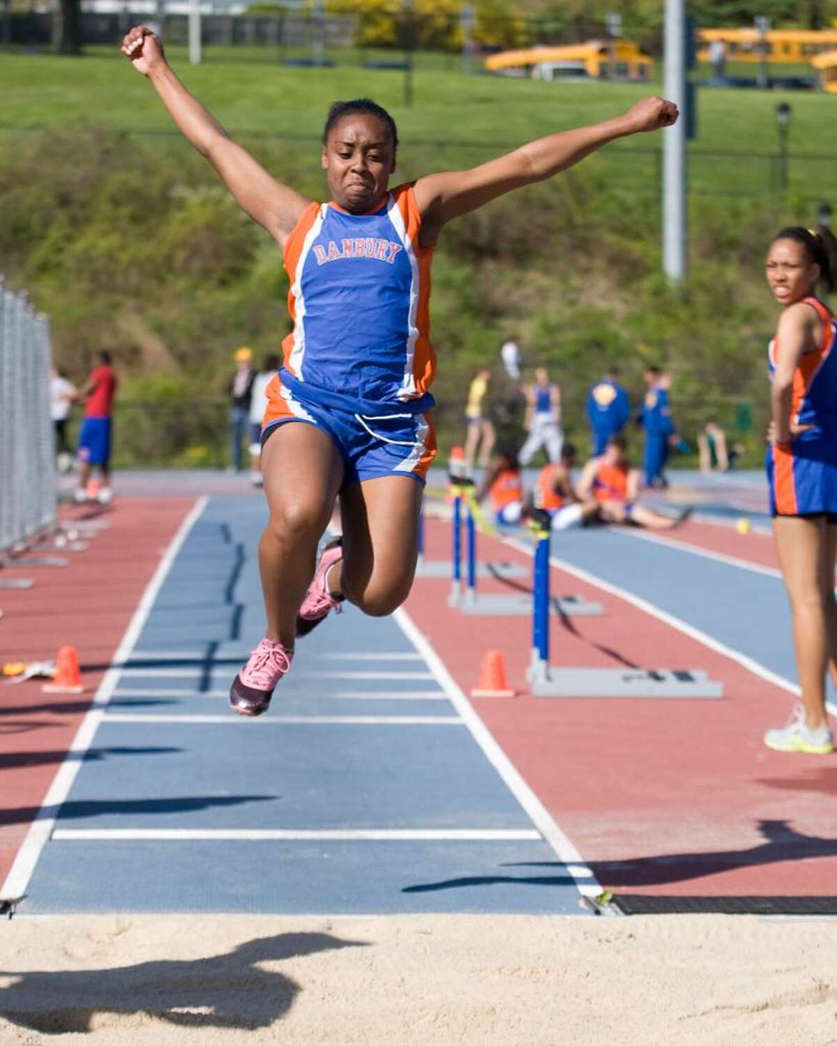 Danbury's Destiny Smith triple jumps during competition at the O'Grady Relays Saturday at Danbury High.