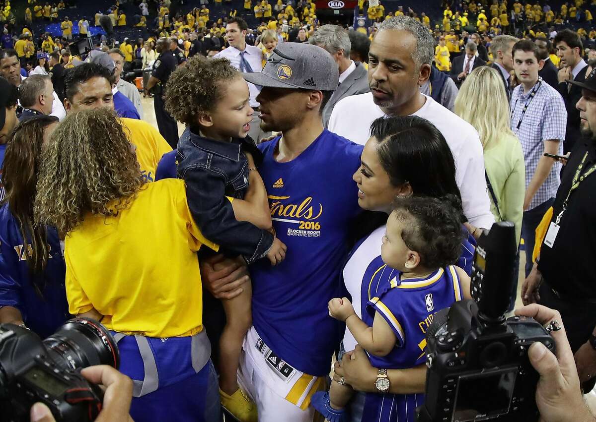 Steph Curry surprises a delighted young fan in the stands