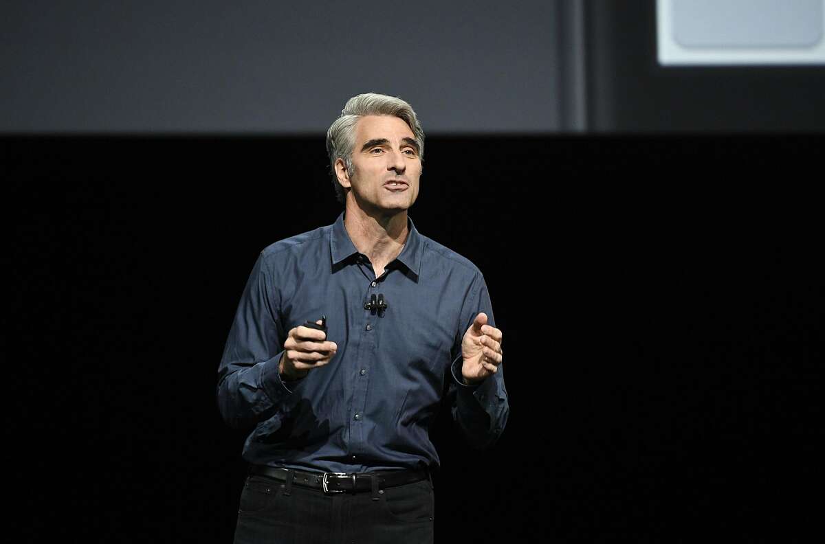 Craig Federighi, senior vice president of Software Engineering at Apple Inc., speaks during the Apple World Wide Developers Conference (WWDC) in San Francisco, California, U.S., on Monday, June 13, 2016. Apple Inc.'s mobile-payment service Apple Pay will now work on websites, a long-awaited feature that will pit the company directly against companies such as PayPal Holdings Inc. Photographer: David Paul Morris/Bloomberg
