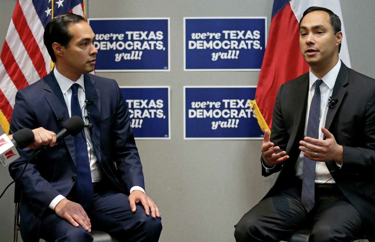 Secretary of Housing and Urban Development and former San Antonio mayor Julian Castro (left) and his twin brother U.S. Rep. Joaquin Castro, D-San Antonio, answer questions from the media at a press conference during the 2016 Texas Democratic Convention held Friday June 17, 2016 at the Alamodome.