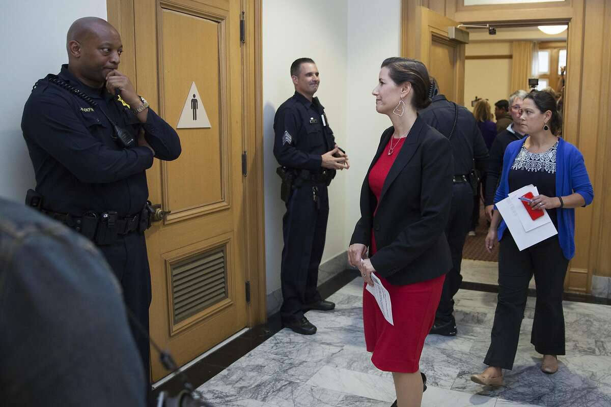 Oakland Mayor Libby Schaaf glances over to Oakland Police Officer Hookfin as she exits a meeting room followed by City Administrator Sabrina Landreth who was recently appointmented to over see the Oakland Police department during a press conference at City Hall in Oakland, California, USA 17 Jun 2016. (Peter DaSilva/Special to The Chronicle)