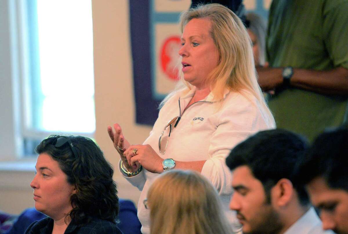 Maureen Boylan of Stamford comments during a roundtable meeting with elected officials and leaders from the LGBT and Muslim communities at the Rainbow Café Meeting Room in the First Congregational Church of Stamford on Saturday, June 18, 2016. Over 100 people gathered to discuss ways on how we can move forward together to combat hate in our society.