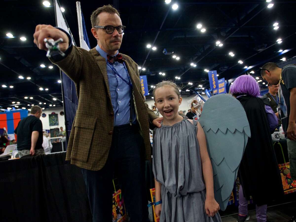 Andrew Dansby, left, dressed as the Eleventh Doctor, poses for a photo with his daughter, Hazel Britton Dansby, dressed as a Weeping Angel, during Comicpalooza, at the George R. Brown Convention Center, Saturday, June 18, 2016, in Houston.