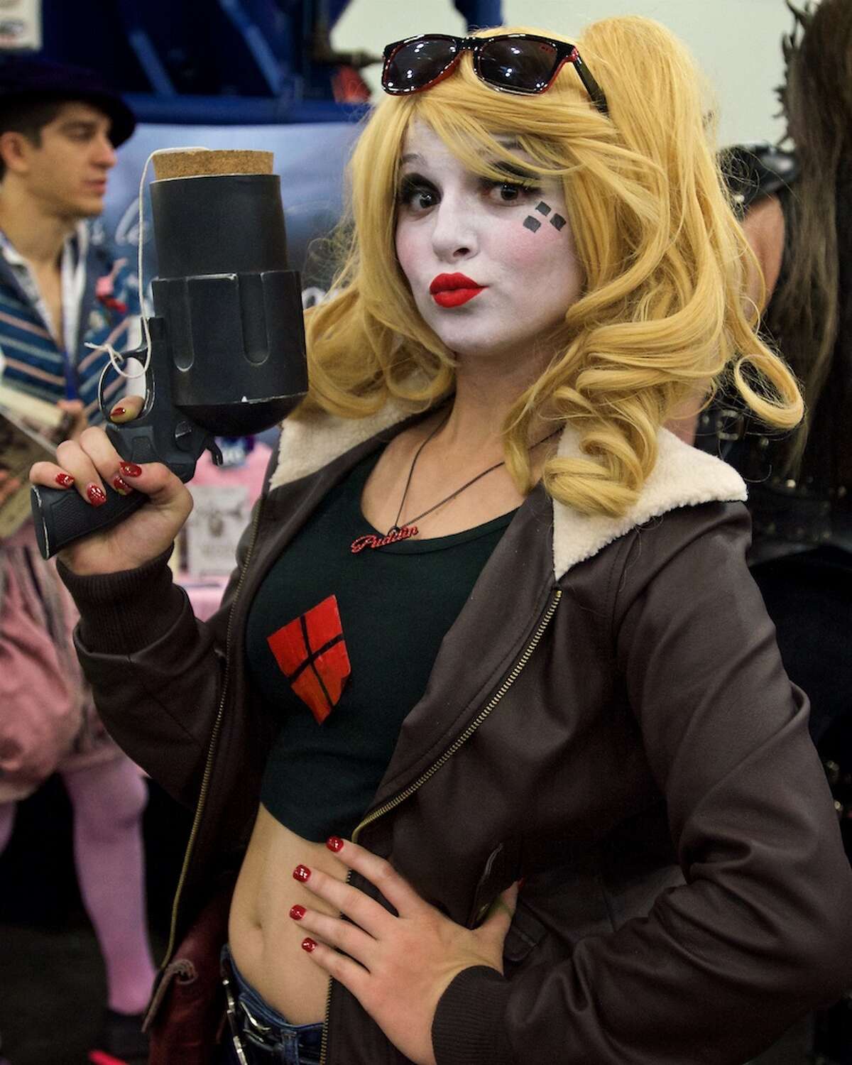 A fan dressed as Harley Quinn poses for a photo during Comicpalooza, at the George R. Brown Convention Center, Saturday, June 18, 2016, in Houston.
