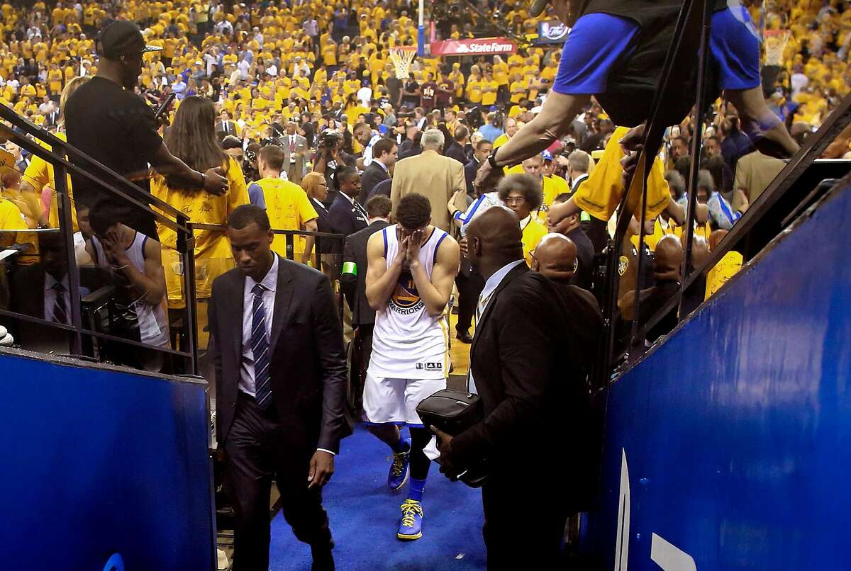 Warriors' Klay Thompson heads to the locker room after the Golden State Warriors lost to the the Cleveland Cavaliers 93-89 in game 7 of the NBA Championship at Oracle Arena in Oakland, California on Sun. June 19, 2016.