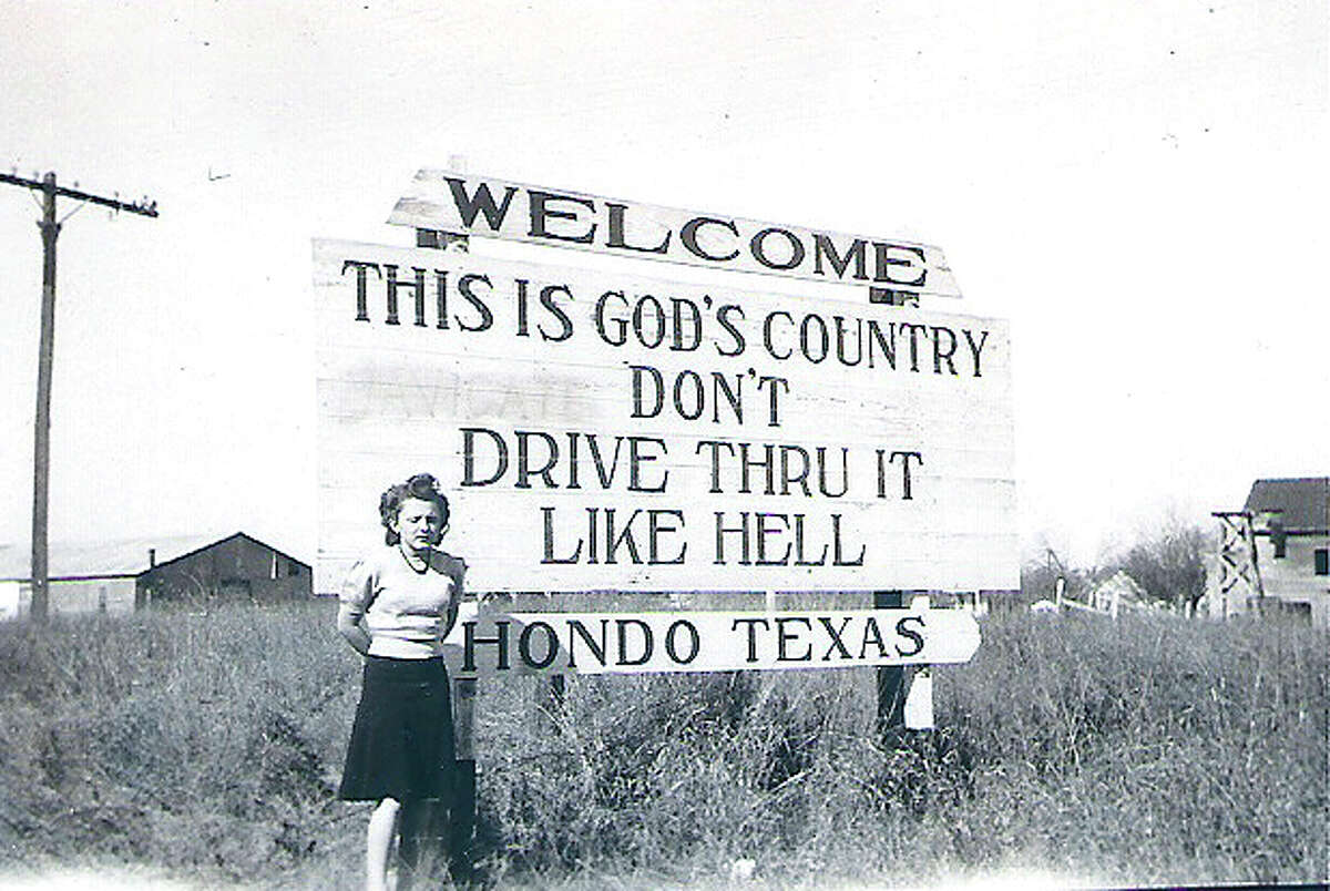 Hondo's original "This is God's Country, Don't Drive Thru It Like Hell" sign is seen in this 1944 photo.