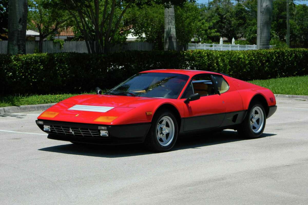 1984 FERRARI 512 BBI—With coachwork by Scaglietti, the 512 Berlinetta Boxer series is the last truly handmade Ferrari. Powered by a 340hp Flat 12 engine, the 512 BBi is shifted by way of a 5-speed rear-mounted transaxle controlled by an iconic gated shifter. 17,592 km (10,931 original miles)