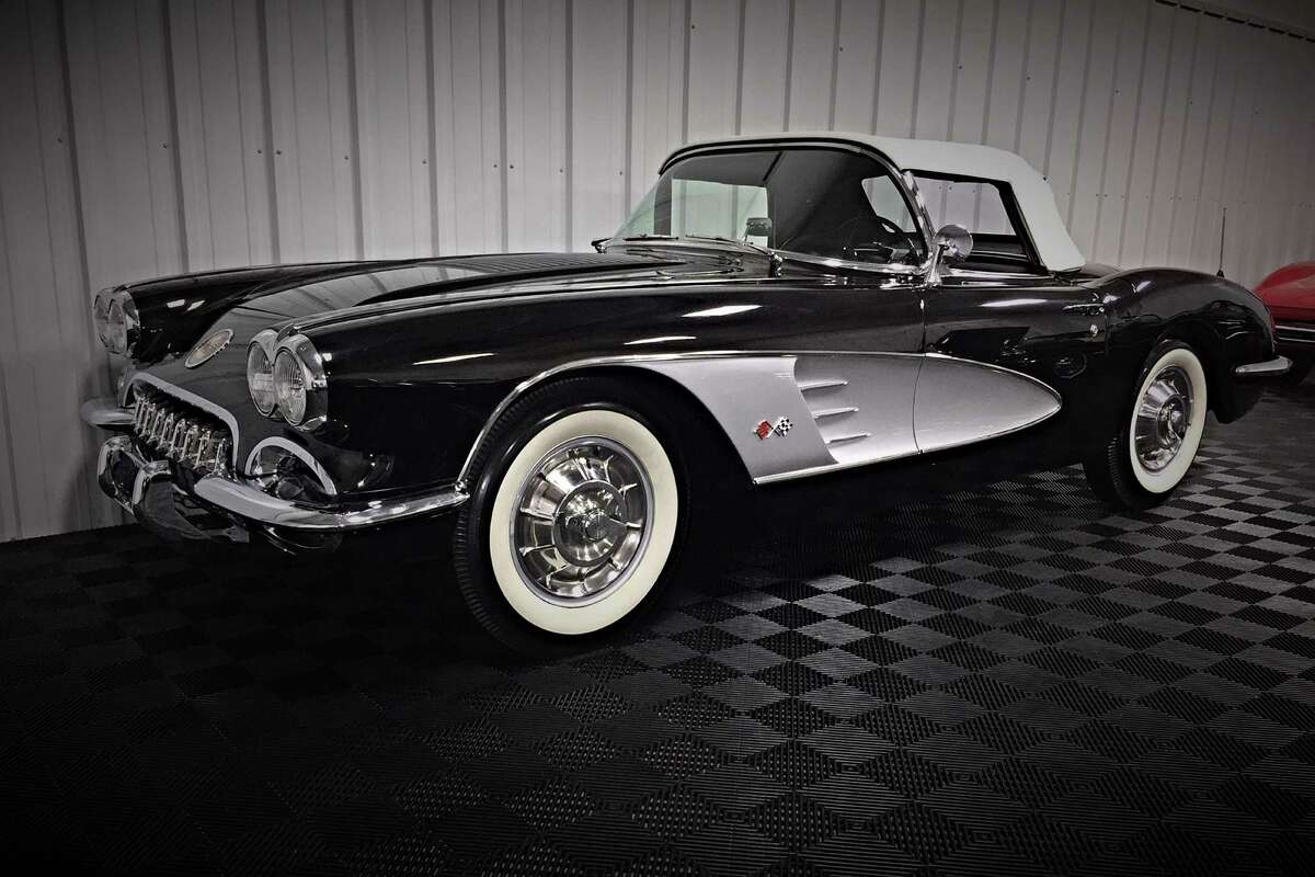 1958 CHEVROLET CORVETTE CONVERTIBLE—Features the correct 283ci engine with a 4-barrel carburetor and 4-speed transmission. 1958 Corvettes have the unique, one-year-only lowered hood and trunk spears.