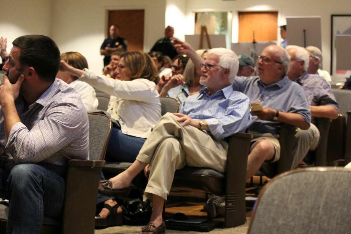 The audience reacts to the DOT at a meeting on the fate of the Saugatuck Swing Bridge at Town Hall on June 6,2016 in Westport, CT.