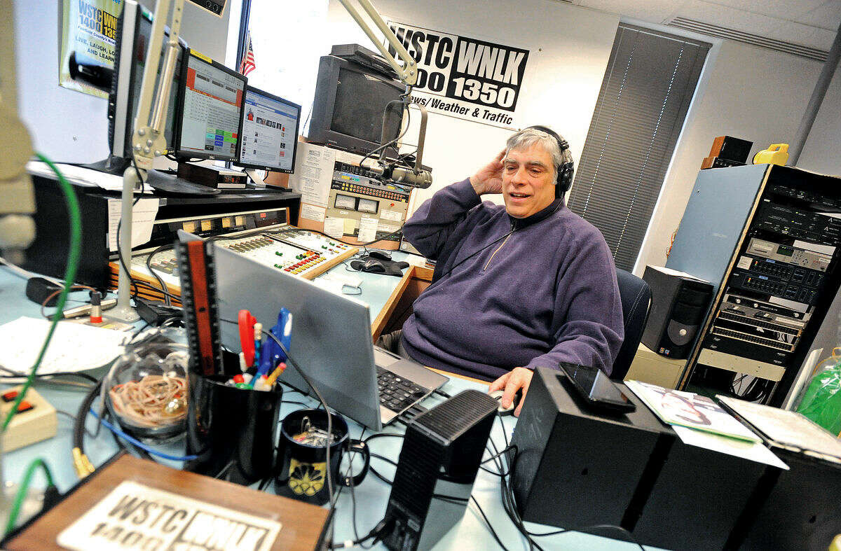This file photo shows DJ John Labarca as he hosted his final radio broadcast of The Italian House Party from the Cox Media group on WNLK/WSTC in Norwalk.