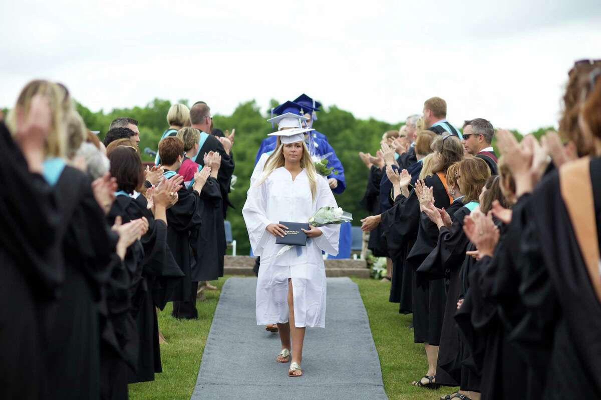 Shepaug Valley School Class President Alexandra Hubbell leads the procession concluding commencement exercises at the school June 11.