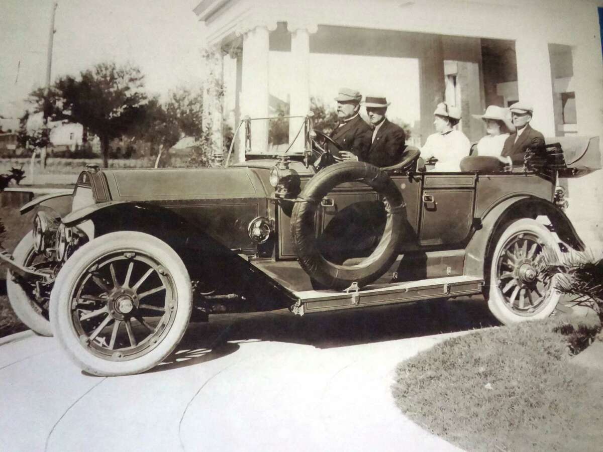 Judge James Luby (left), in his 1913 Stoddard Dayton automobile, built the King William house in 1907.