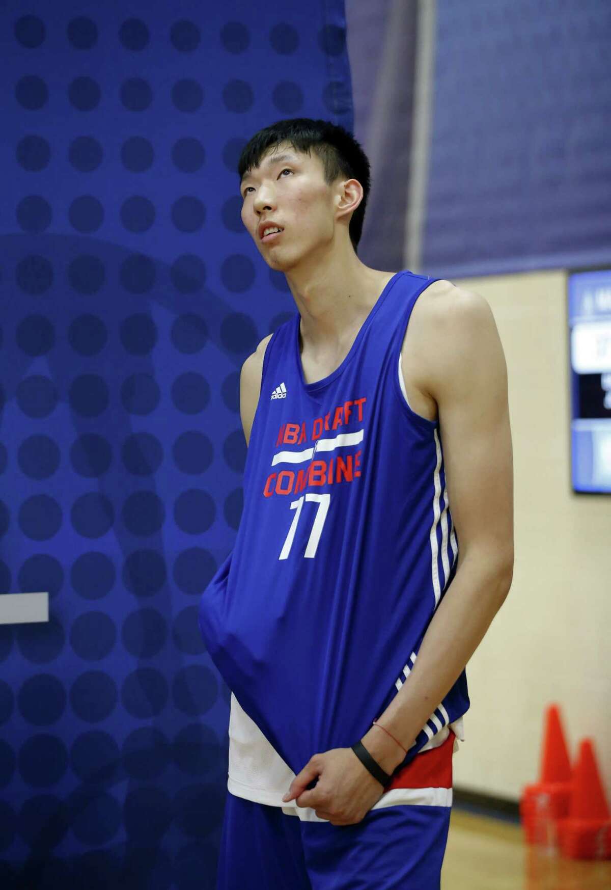 Zhou Qi, from China, participates in the NBA draft basketball combine Thursday, May 12, 2016, in Chicago. (AP Photo/Charles Rex Arbogast)