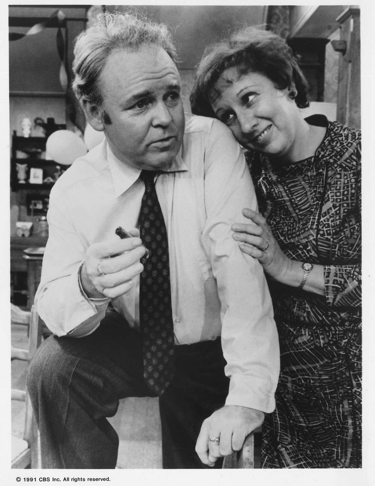 JUN 12, 1991. Carroll O'Connor and Jean Stapleton star as Archie and Edith Bunker on the landmark series ALL IN THE FAMILY, which returns to television Sunday, June 2 (8:30-9:00 PM, ET/PT) on the CBS Televison Network for six episodes. The series will follow SUNDAY DINNER (8:00-8:30 PM, ET/PT), Norman Lear's latest comedy entry, on the CBS Television Network. HOUCHRON CAPTION (01/02/2000): "All in the Family" - 1971-1979. HOUCHRON CAPTION (12/25/2000): Carroll O'Connor and Jean Stapleton, in left photo, starred as Archie and Edith Bunker in the breakthrough sitcom All in the Family (1971-79). HOUCHRON CAPTION (03/11/2002): Archie Bunker, who was played by Carroll O'Connor, makes a good case for home ownership.