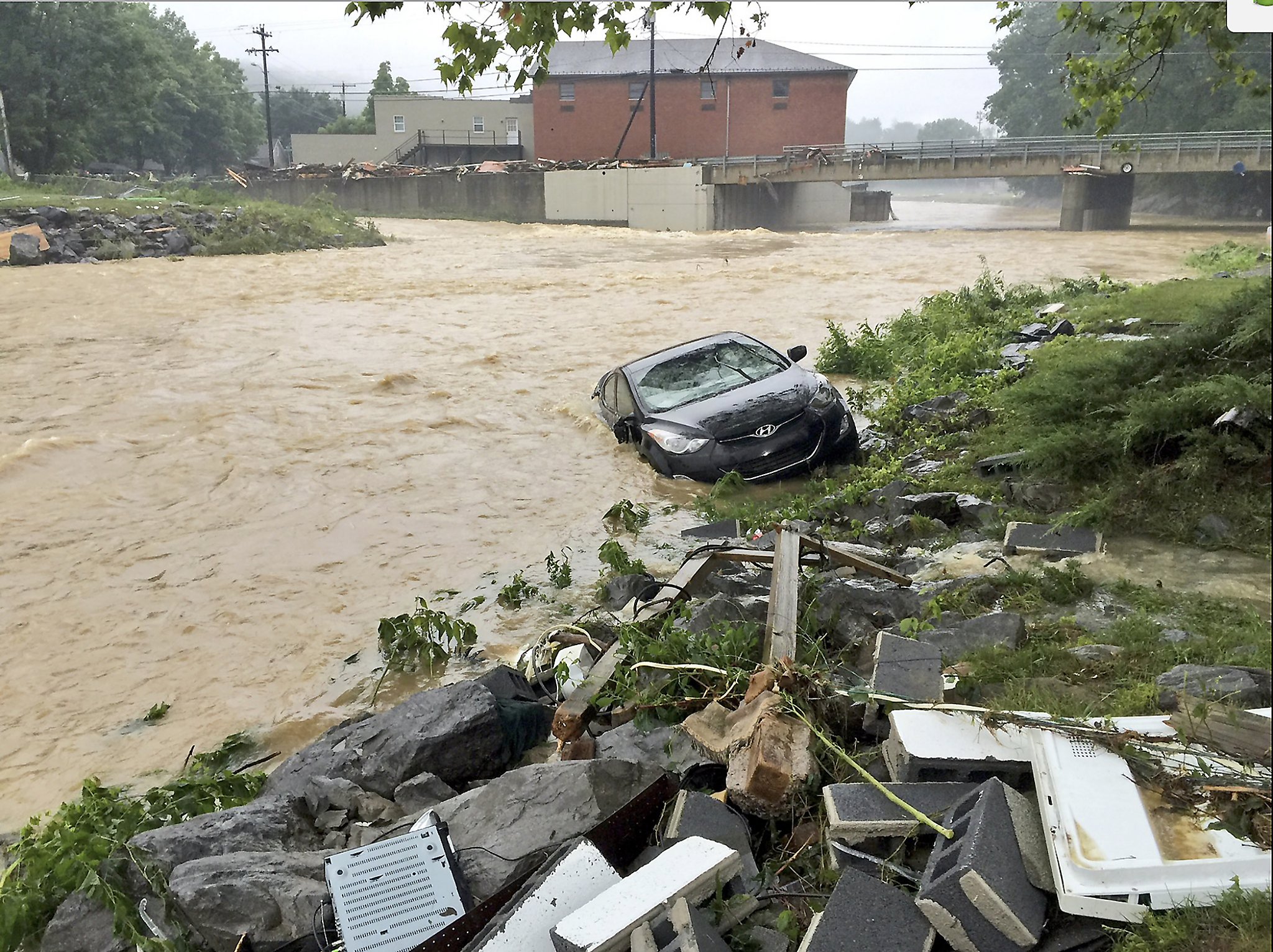 chaos’ in West Virginia flooding, 23 killed