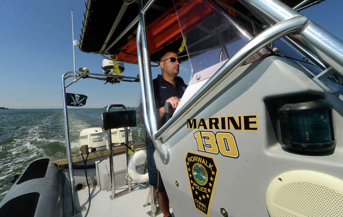 Officer with The Norwalk Police Services Marine Unit, Rich Dalallo, patrols Norwalk Harbor Friday, June 24, 2016 in Norwalk Conn. ahead of Operation Dry Water, a national crackdown on boating under the influence. The nationwide awareness and enforcement campaign is a partnership of the Norwalk Department of Police Services, the National Association of State Boating Law Administrators and the U.S. Coast Guard with a mission of putting an end to impaired boating.