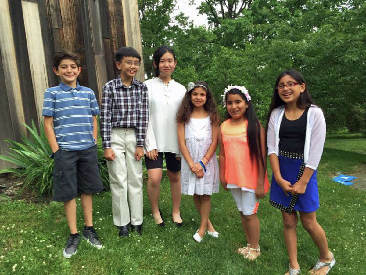 2016 Hamilton Avenue junior docents Amedeo Furano, Charles Miranda, Ellie Konno, Christina Brunetti, Dianna Palacios and Daniella Regalado take a break from helping put together an exhibition at the Greenwich Historical Society to showcase about what they learned during field trips to Bush-Holley Historic Site. Students from all grades at the school visit the site during the school year, with third-, fourth- and fifth-grade classes focusing on the history and art collections in Bush-Holley House.