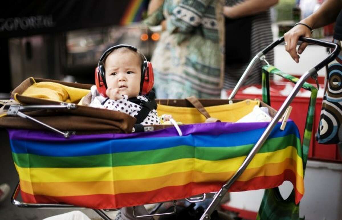 Little ones will appreciate noise protection gear at San Francisco’s Gay Pride Parade. (Getty)