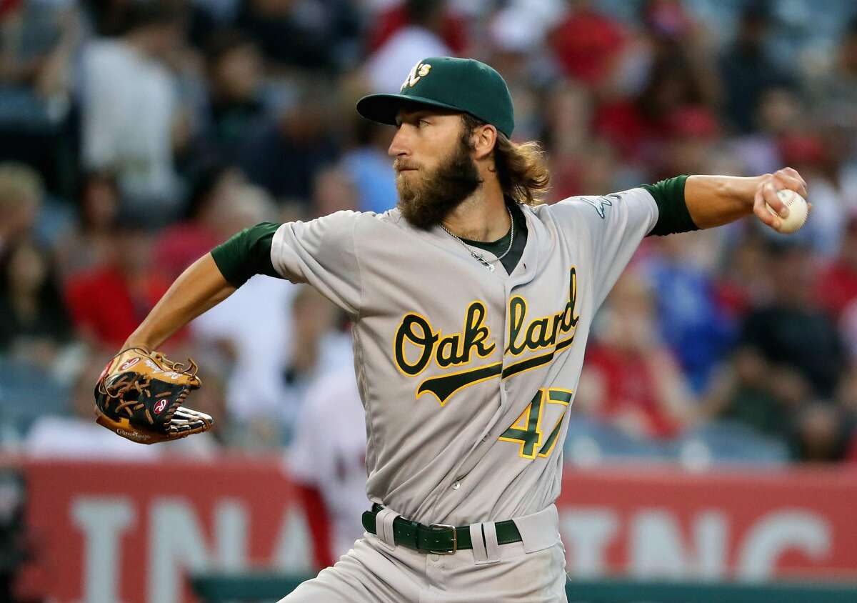 ANAHEIM, CA - JUNE 25: Dillon Overton #47 of the Oakland Athletics pitches during the second inning of a baseball game against the Los Angeles Angels of Anaheim at Angel Stadium of Anaheim on June 25, 2016 in Anaheim, California. (Photo by Sean M. Haffey/Getty Images)