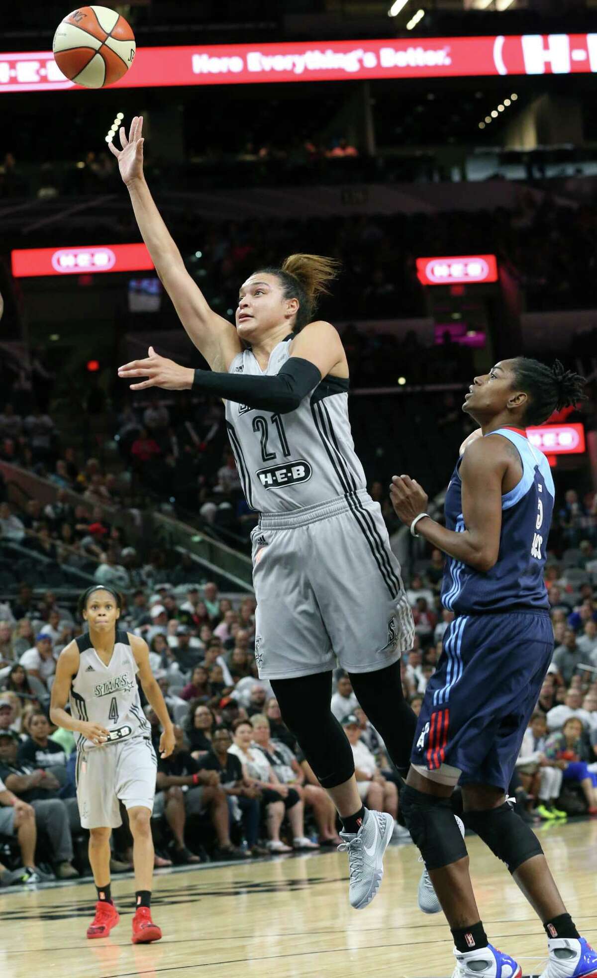 Kayla McBride throws up a runner as she turns on the heat in the fourth quarter as the Stars host Atlanta at the AT&T Center on June 25, 2016.