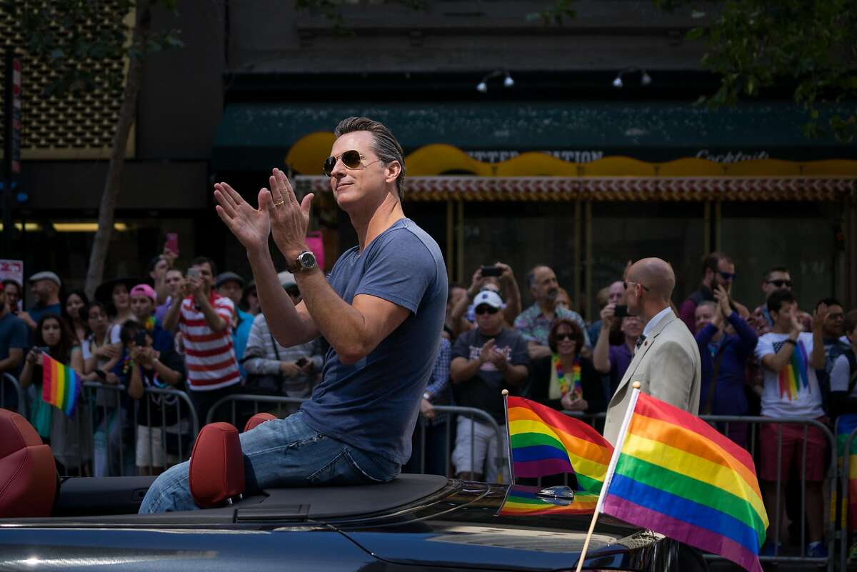 Lt. Governor Gavin Newsom waves to the crowd during the annual Pride Parade in downtown San Francisco on Sunday, June 26, 2016. The theme for the parade this year is For Racial and Economic Justice.