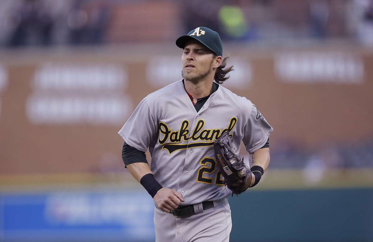 Oakland Athletics right fielder Josh Reddick runs to the dugout during the second inning of a baseball game against the Detroit Tigers, Monday, April 25, 2016 in Detroit. (AP Photo/Carlos Osorio)