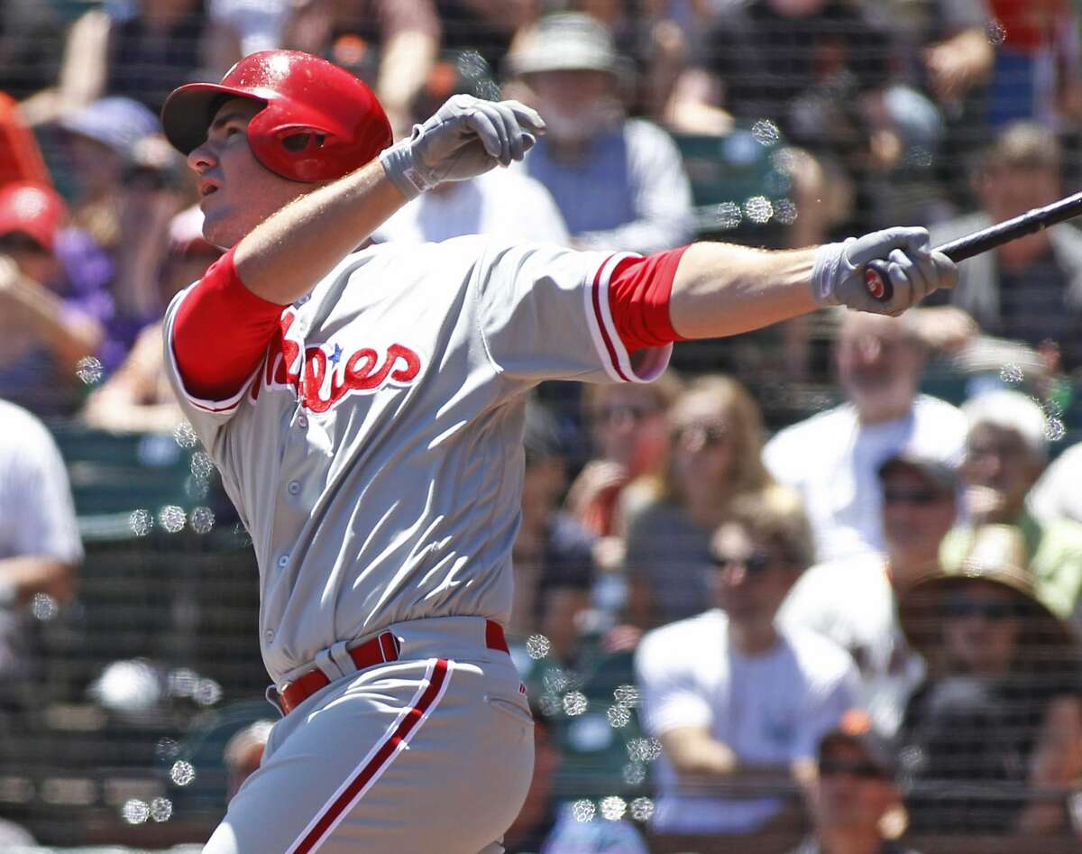 Philadelphia Phillies' Tommy Joseph hits an RBI-sacrifice fly against the San Francisco Giants during the first inning of a baseball game, Sunday, June 26, 2016, in San Francisco. (AP Photo/George Nikitin)