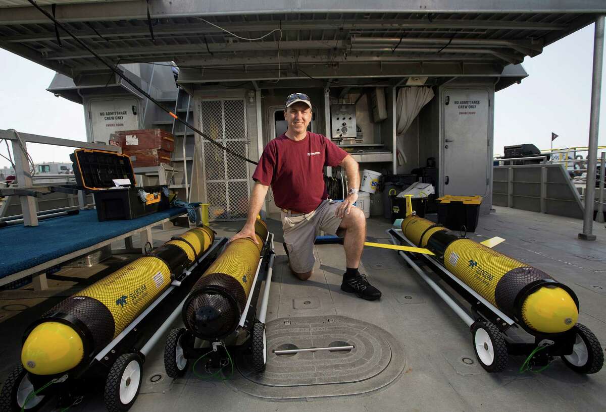 Portrait of Steve DiMarco a Texas A&M oceanography professor and ocean observing team leader, on the boat the RV Manta, next to a group of Slocum gliders that will provide oxygen readings in the "dead zone" along the Texas and Louisiana coast Tuesday, June 17, 2014, on Pelican Island in Galveston. The gliders will be dropped off at three different points and left until September where he and his team will be able to obtain oxygen and physiological readings of the water while in College Station and then provides that data to organizations such as the National Oceanic and Atmospheric Administration (NOAA). ( Johnny Hanson / Houston Chronicle )
