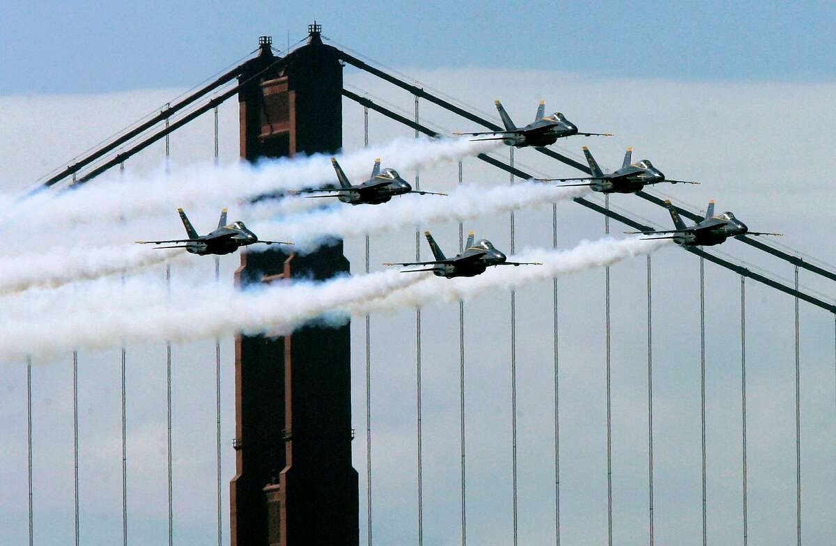 Blue Angels jets fly in front of the Golden Gate Bridge during practice in San Francisco, in this Oct. 4, 2007 file photo. 