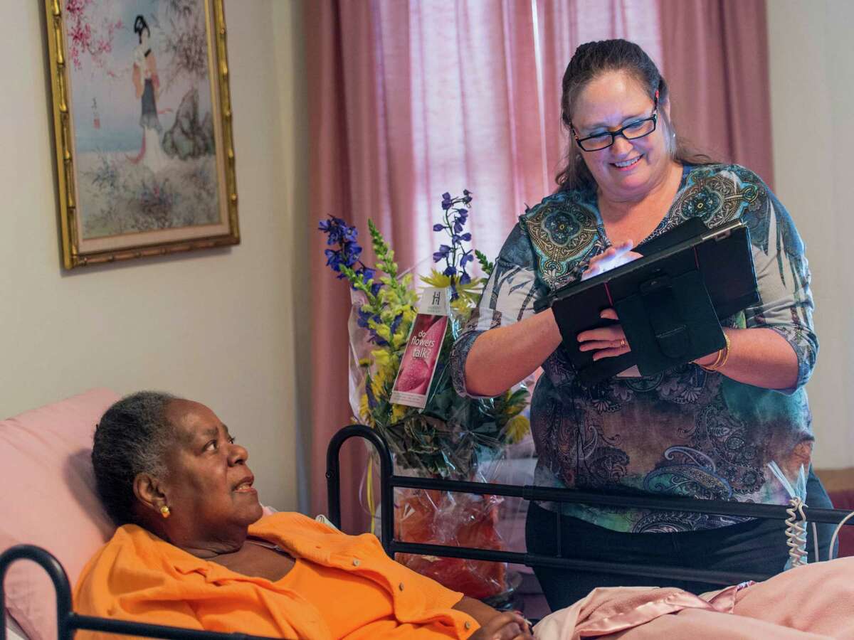 Virginia Oliver gets a visit at her home in Bridgeport, CT from Collette Sengupta of the Visiting Nurse Services of Connecticut on Friday, June 24, 2016. With this meeting the Visiting Nurse Services of Connecticut reached the 10 Million patient care visits mark.