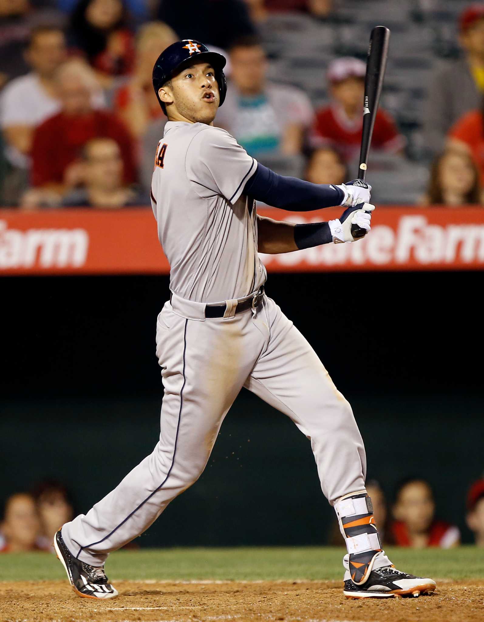 Astros hold off Angels for 8th win in 9 games