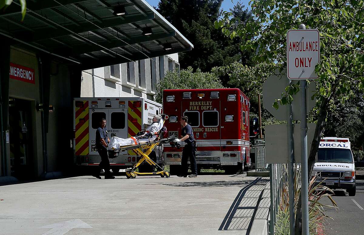 A patient being transported through the emergency room of Sutter Health Alta Bates Summit medical center on Sunday, June 26, 2016 in Berkeley, Calif.