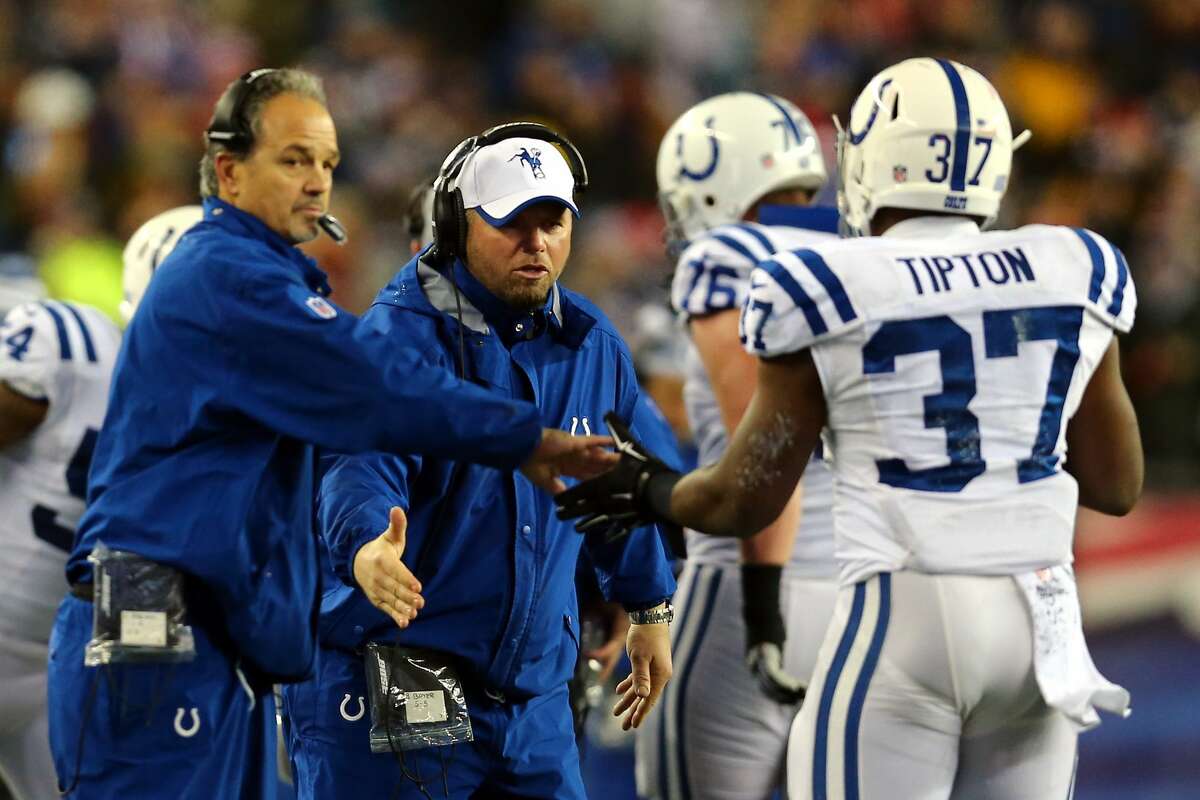 Assistant special teams coach Brant Boyer celebrates a touchdown by Zurlon Tipton #37 of the Indianapolis Colts in the second quarter against the New England Patriots of the 2015 AFC Championship Game at Gillette Stadium on January 18, 2015 in Foxboro, Massachusetts.