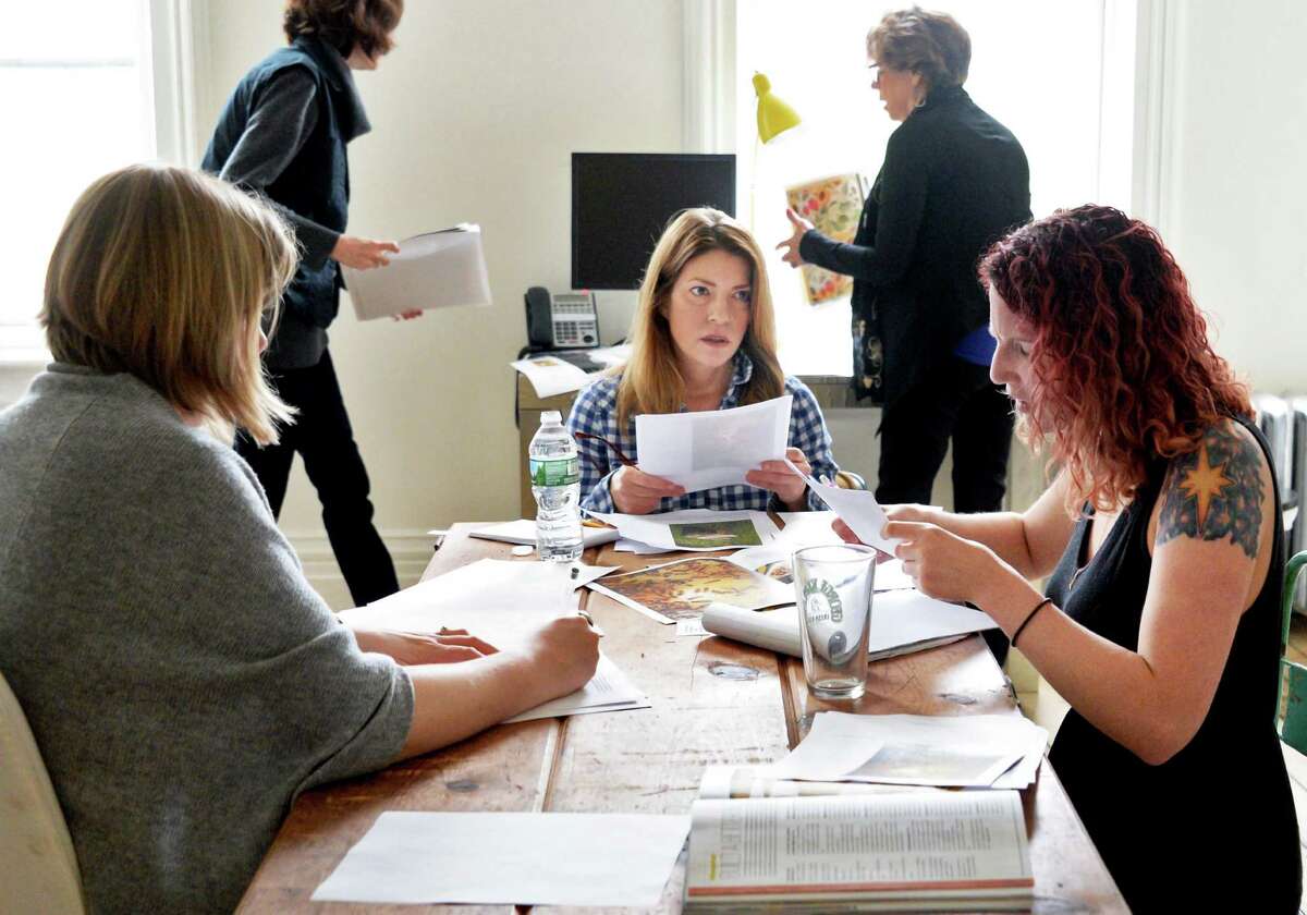 Editor-in-chief Sarah Gray Miller, center, and her staff work on the summer issue of Modern Farmer magazine in their Warren Street offices Tuesday May 3, 2016 in Hudson , NY. (John Carl D'Annibale / Times Union)